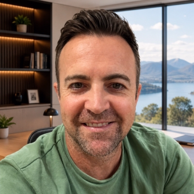 Murray, founder and coach at Master Midlife, smiling in a home office setting